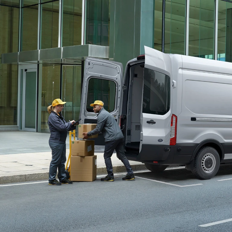Loading deliveries into a Ford van